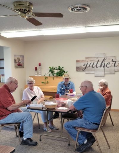 webster south dakota housing authority apartment interior community room with residents